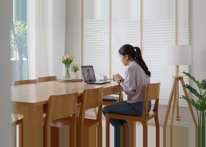 woman doing a telemedicine appointment from home.