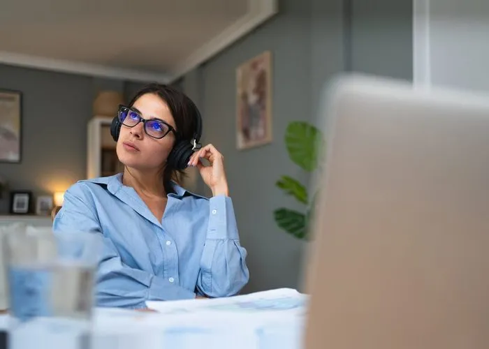 young woman with adhd and anxiety trying to work.