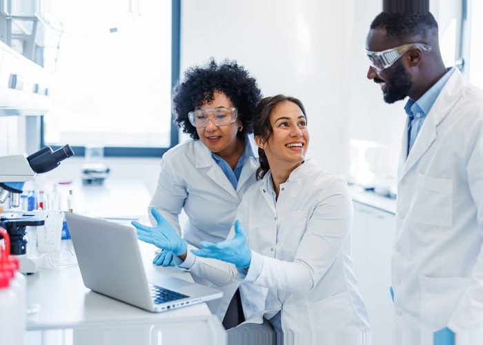 scientists doing genetic testing.